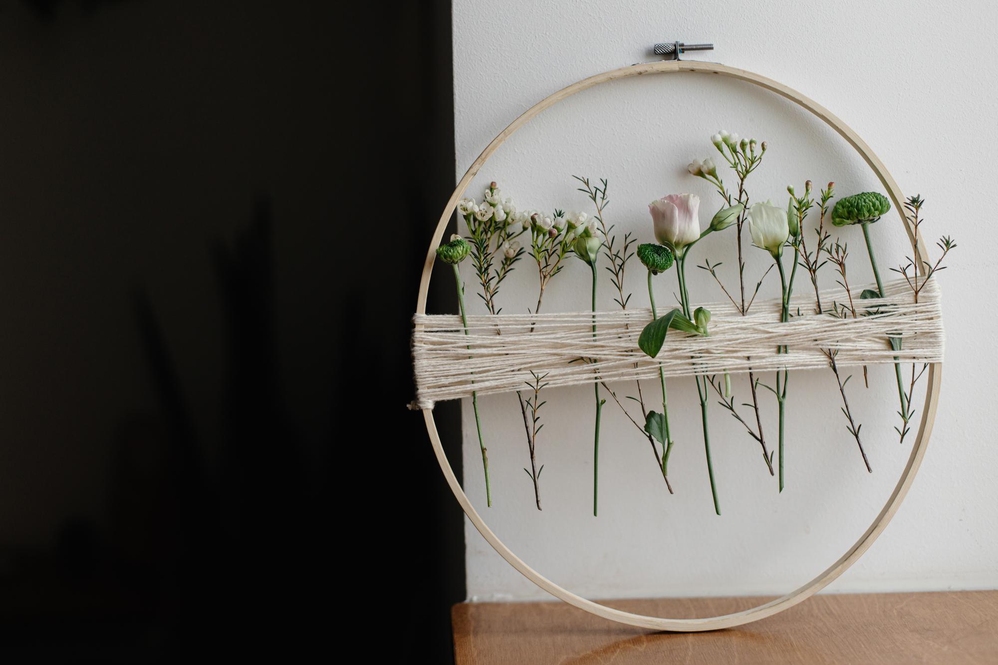 Interior view of embroidery studio with frame and threads