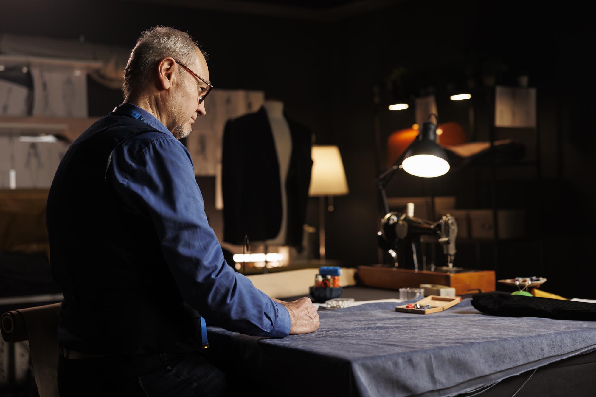 Portrait of lead embroiderer at work